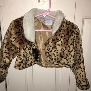 Disney leopard shrug